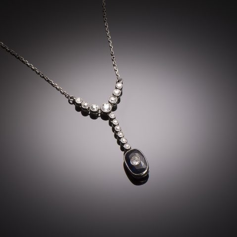 Art Deco diamond necklace including main diamond set in a sapphire