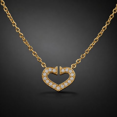 Collier C de Cartier en or jaune et diamants