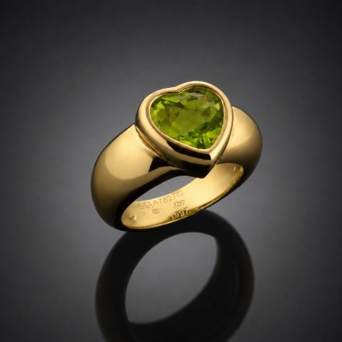 Bague Piaget péridot en or (15,10 grs)